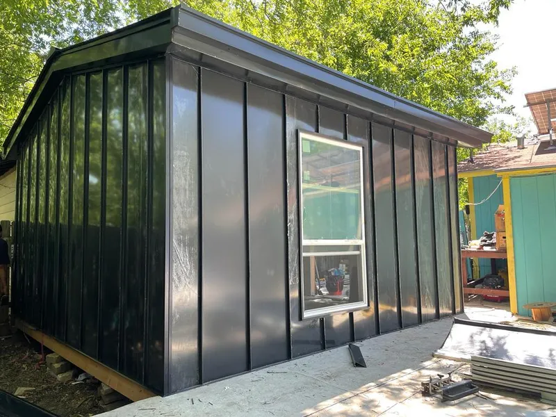 Black standing seam metal wall panels for Roof Inspection in Lyndhurst