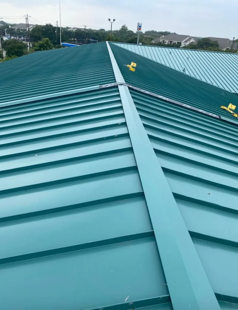 Green commercial metal roof ridge and valley for Metal Roof Repair in Lyndhurst